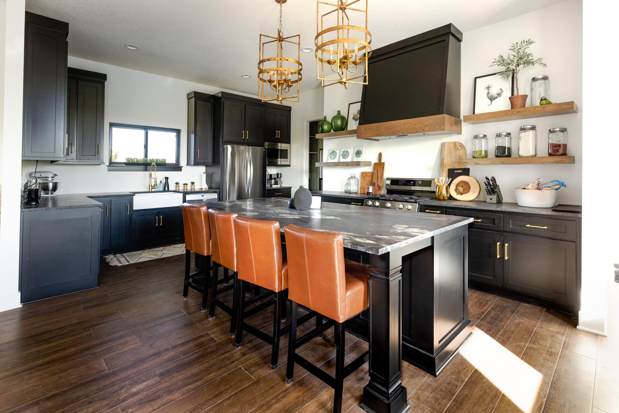 Modern kitchen with dark cabinets and island chairs, Worth It